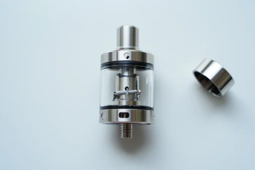 A clean vape tank and coil, illustrating the importance of maintenance for the best vape flavour.